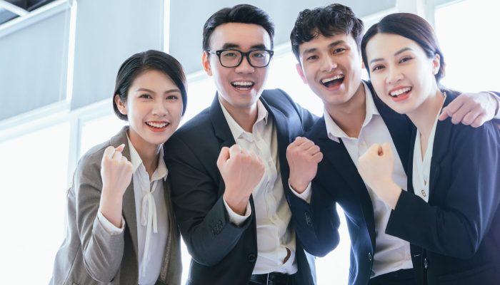 Group portrait of Asian business people